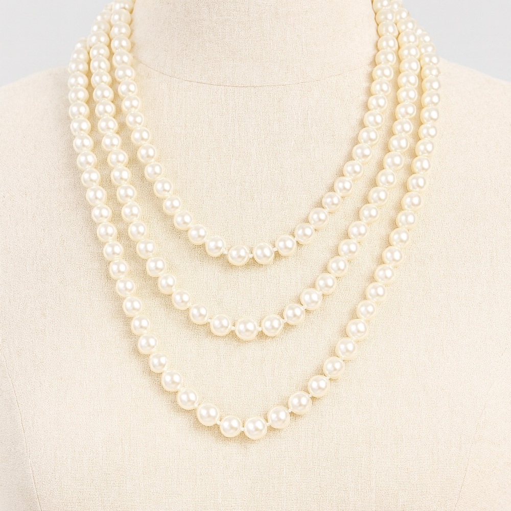 Multi strand faux pearl necklace.